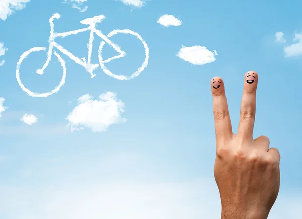 Happy smiley fingers looking at a bicycle shapeed cloud — Stock Photo, Image