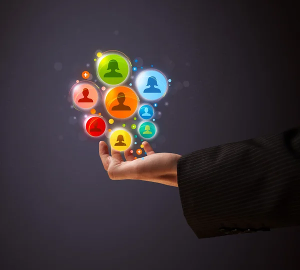 Social network icons in the hand of a businessman — Stock Photo, Image