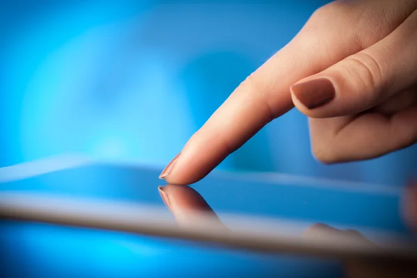 Finger pointing on tablet pc with empty space — Stock Photo, Image