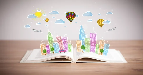 Cityscape drawing on open book — Stock Photo, Image