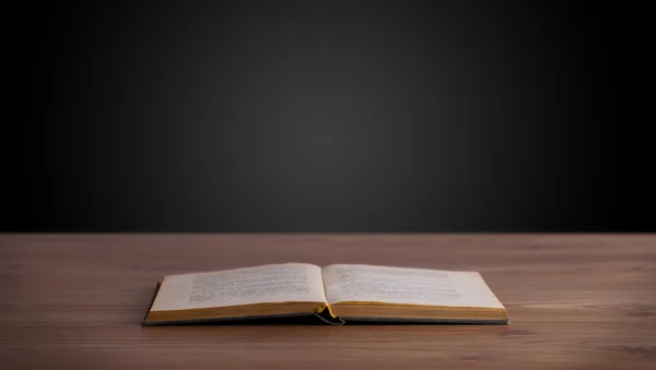 Open book on wooden deck — Stock Photo, Image