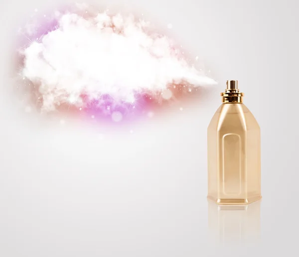 Beautiful bottle spraying colorful cloud — Stock Photo, Image