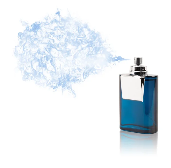 Perfume bottle spraying colored scent — Stock Photo, Image