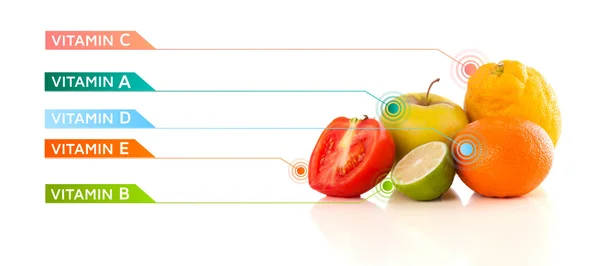 Healthy fruits with colorful vitamin symbols and icons — Stock Photo, Image