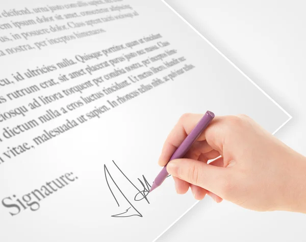 Hand writing personal signature on a paper form — Stock Photo, Image