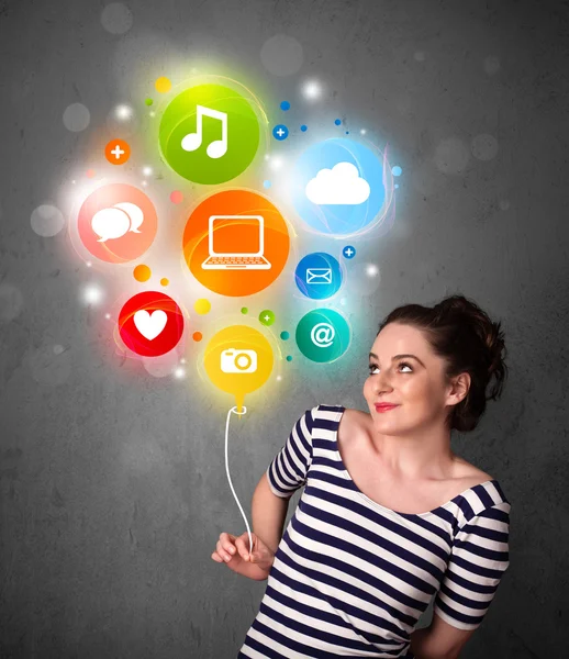 Woman holding social media balloon — Stock Photo, Image