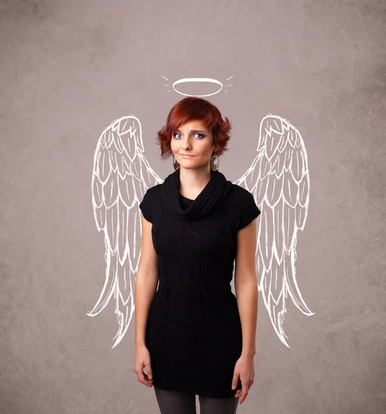 Söt flicka med ängel illustrerade vingar — Stockfoto