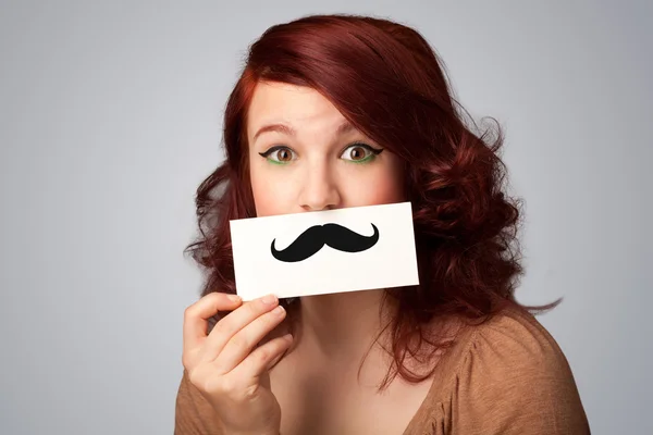 Menina bonito feliz segurando papel com desenho de bigode — Fotografia de Stock