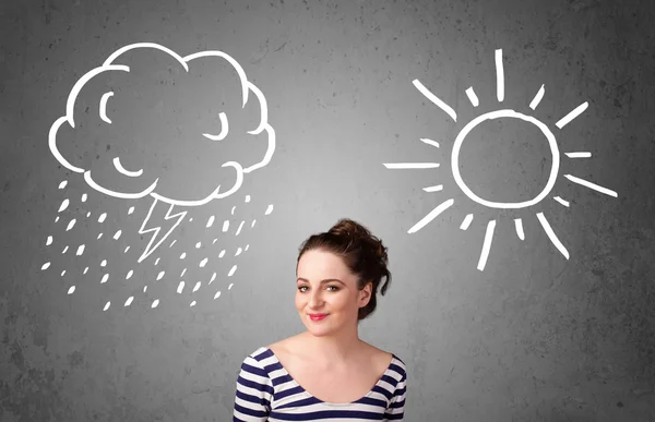 Vrouw stond tussen een zon en een regen tekening — Stockfoto