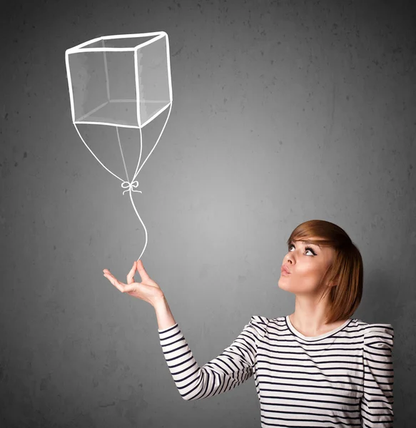 Kvinna med en kub ballong — Stockfoto