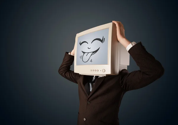 Uomo d'affari felice con un monitor del computer e una faccia sorridente — Foto Stock