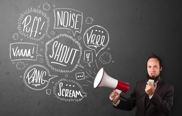 Guy in suit yelling into megaphone and hand drawn speech bubbles — Stock Photo, Image