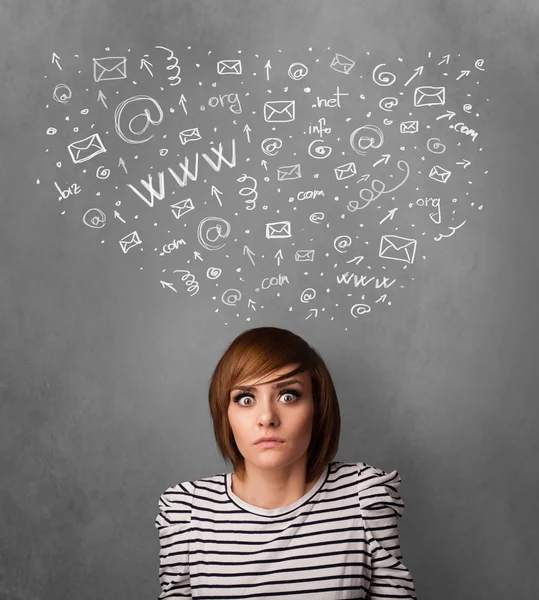 Young woman thinking with social network icons above her head — Stock Photo, Image