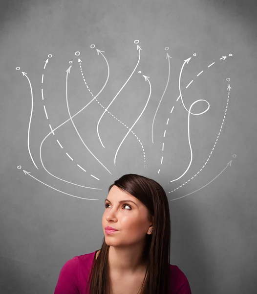 Young woman with arrows coming out of her head — Stock Photo, Image