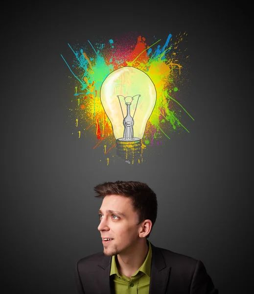 Businessman thinking with lightbulb above his head — Stock Photo, Image