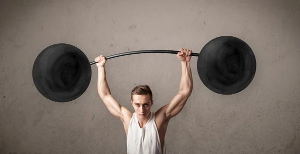 Musclé homme levant des poids — Photo