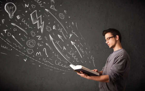 Young man reading a book — Stock Photo, Image