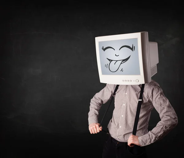 Uomo d'affari felice con un monitor del computer e una faccia sorridente — Foto Stock