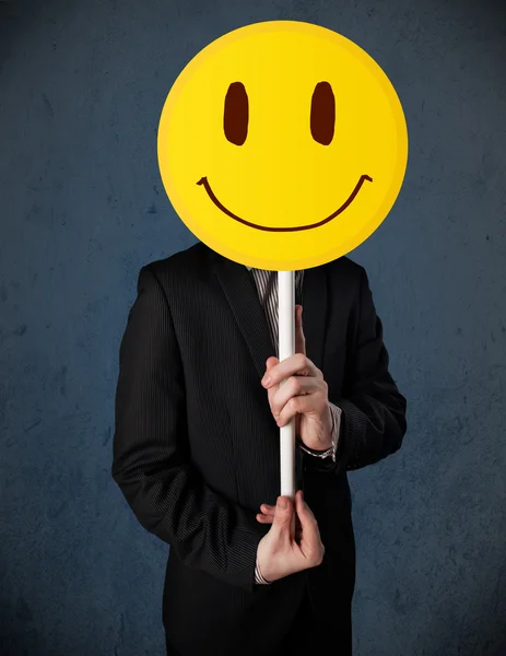 व्यवसायी एक मुस्कुराते हुए चेहरा भावनात्मक — स्टॉक फ़ोटो, इमेज
