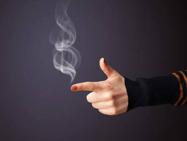 Gun shaped woman hand — Stock Photo, Image