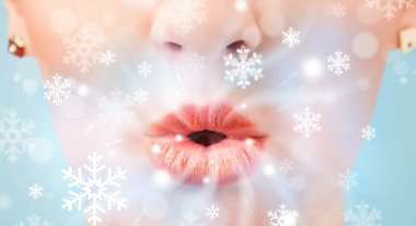 Pretty woman mouth blowing cold breeze clipart