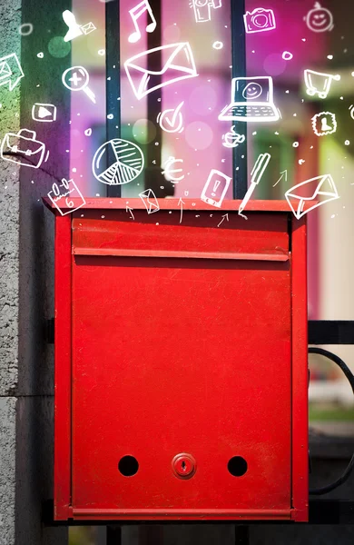 Icônes colorées et symboles éclatant d'une boîte aux lettres — Photo