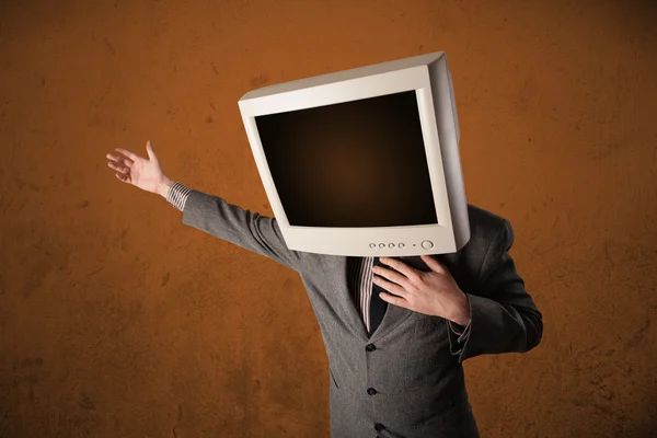 Business man with a monitor on his head and brown empty space — Stock Photo, Image