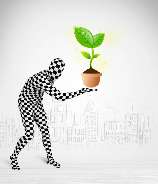 Man in full body suit with eco plant — Stock Photo, Image