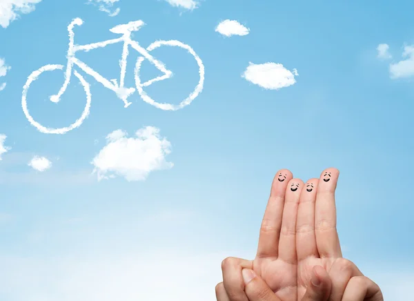 Happy smiley fingers looking at a bicycle shapeed cloud — Stock Photo, Image