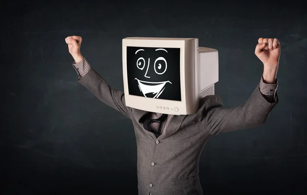 Hombre de negocios feliz con una cabeza de monitor de PC y una cara sonriente —  Fotos de Stock