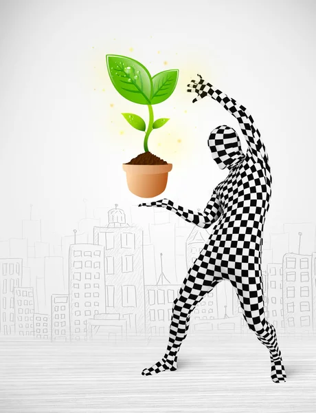 Man in full body suit with eco plant — Stock Photo, Image