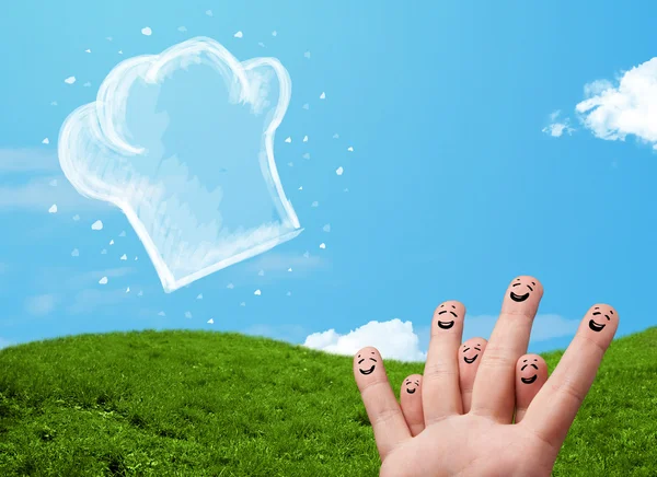 Happy smiley face fingers looking at illustration of cook hat — Stock Photo, Image