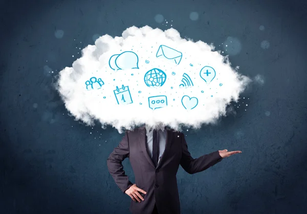 Man in suit with cloud head and blue icons — Stock Photo, Image