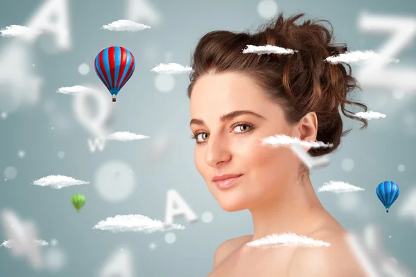 Beautiful young woman with wellness and healthcare clouds — Stock Photo, Image