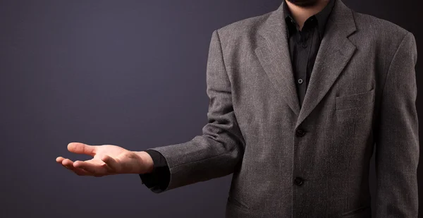 Businessman presenting copy space — Stock Photo, Image