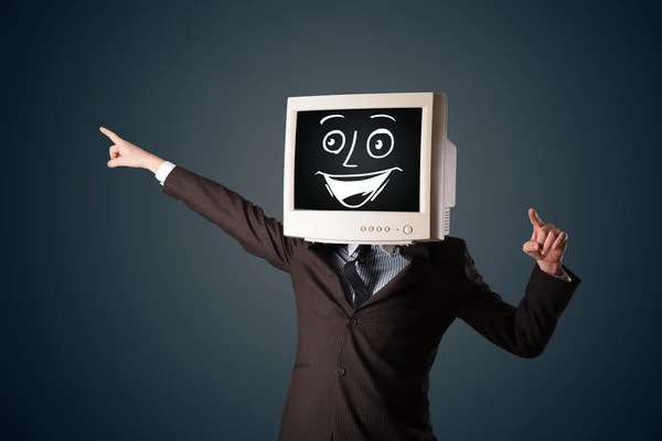 Hombre de negocios feliz con una cabeza de monitor de PC y una cara sonriente —  Fotos de Stock