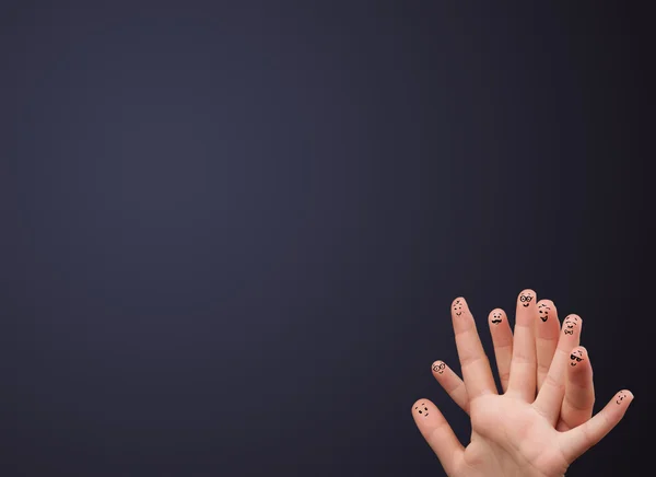 Happy smiley fingers looking at empty wall copyspace — Stock Photo, Image