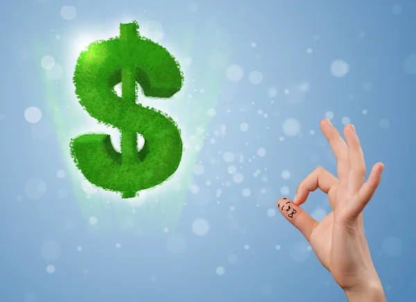 Happy smiley fingers looking at green leaf dollar sign — Stock Photo, Image