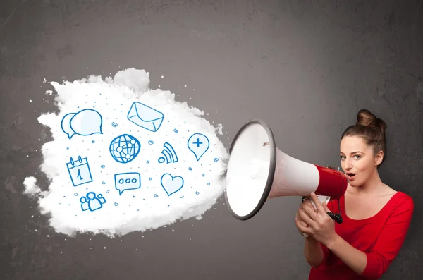 Woman shouting into loudspeaker and modern blue icons and symbol — Stock Photo, Image