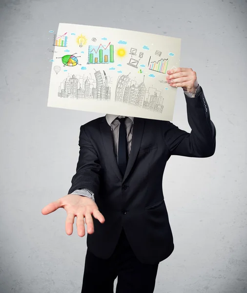 Businessman holding a paper with charts and cityscape in front o — Stock Photo, Image