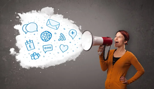 Woman shouting into loudspeaker and modern blue icons and symbol — Stock Photo, Image