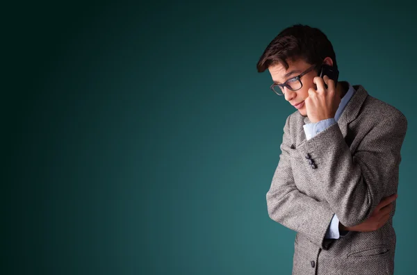 Young man making phone call with copy space — Stock Photo, Image