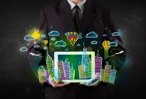 Young person showing tablet with hand drawn cityscape — Stock Photo, Image