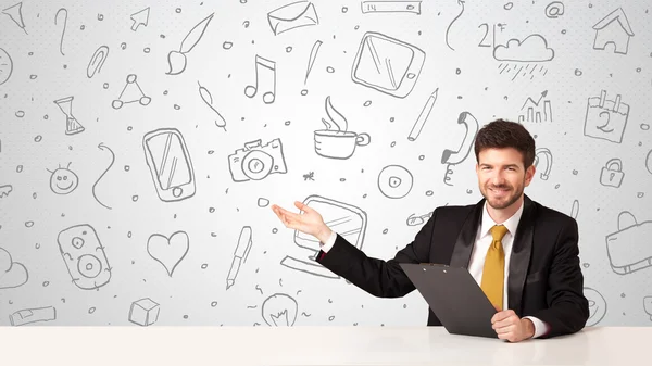 Businessman with social media symbols — Stock Photo, Image