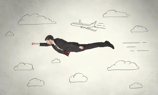 Cheerful business person flying between hand drawn sky clouds — Stock Photo, Image