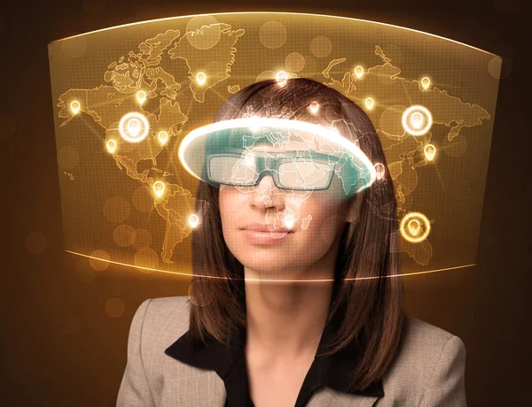 Young woman looking at futuristic social network map — Stock Photo, Image