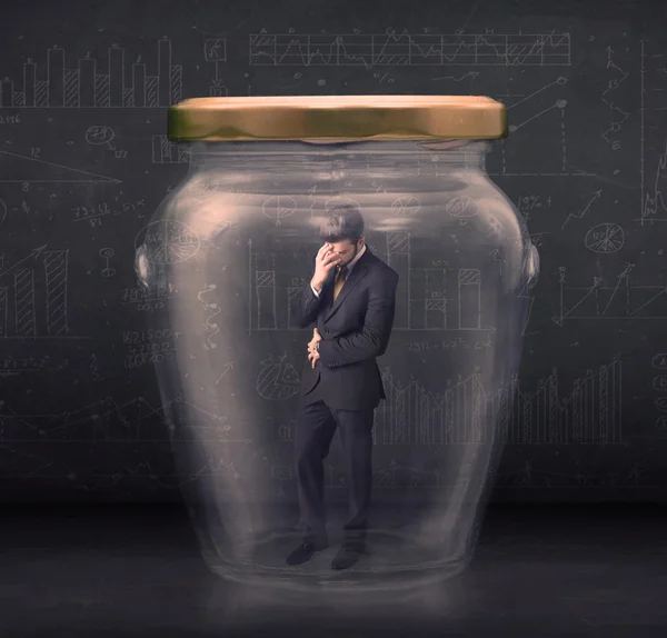 Business man closed into a glass jar concept — Stock Photo, Image