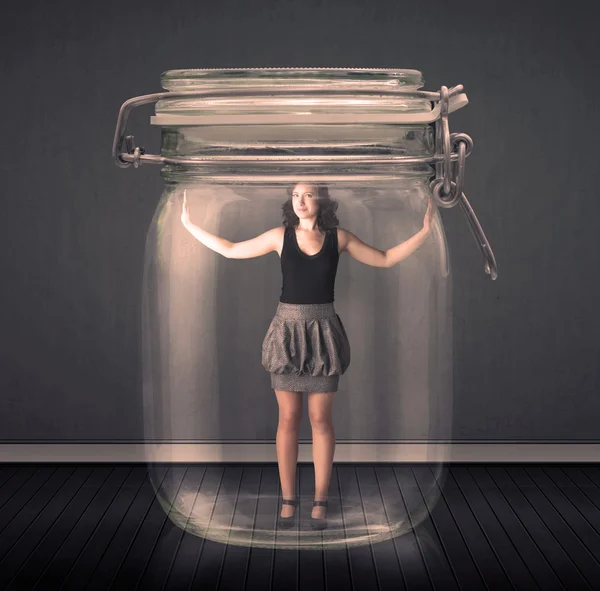 Businesswoman trapped into a glass jar concept — Stock Photo, Image