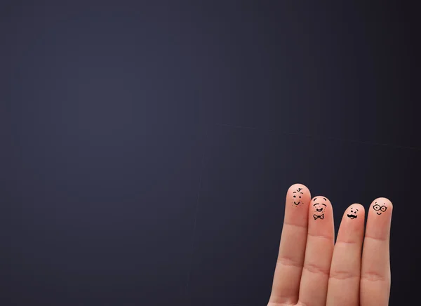 Happy smiley fingers looking at empty wall copyspace — Stock Photo, Image