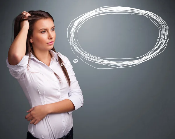 Young lady thinking about speech or thought bubble with copy spa — Stock Photo, Image